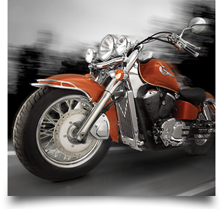 Full motocycle shot of a Honda Shadow with chrome accessories
