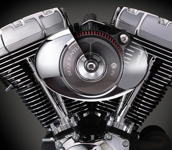 Motorcycle engine showing interior of air cleaner. Photo taken as straight one angle